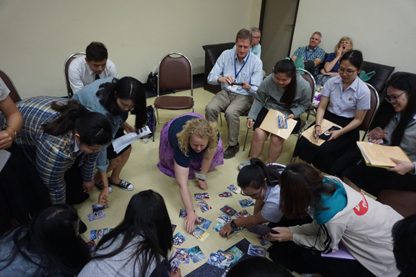 Robin Tracy teaching psychology students at Chiang Mai (Thailand) University, a therapy technique